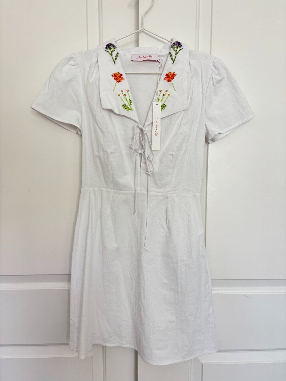 Lisa Says Gah white cotton mini dress, brand new with tags — never worn. Oversi